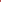 Close-up of high pile texture on red Moroccan rug