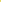 Close-up of the plush yellow surface of the Moroccan rug.